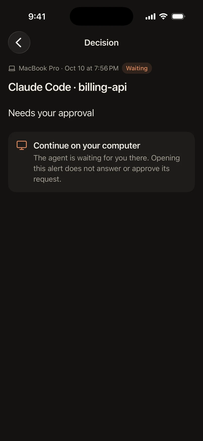 An approval alert that says to continue on your computer